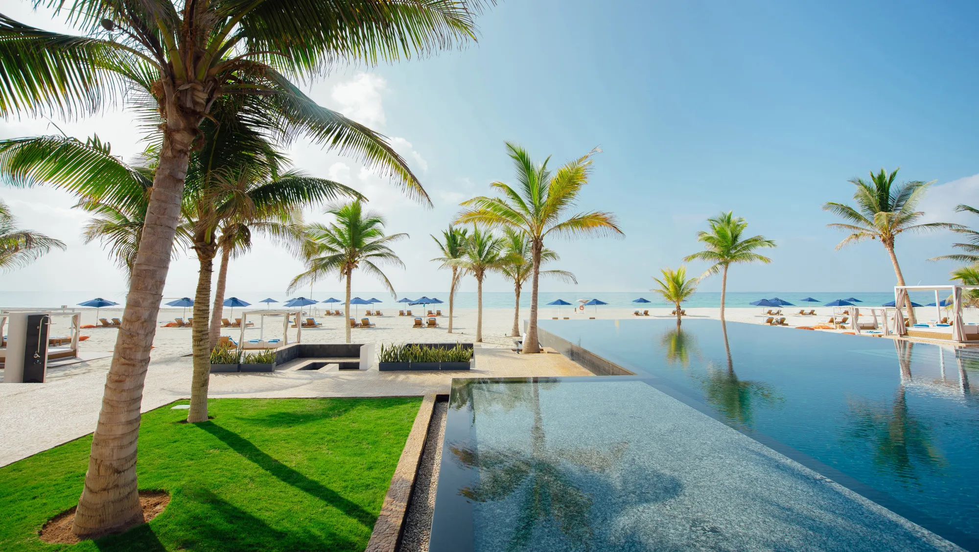 Al_Baleed_Resort_Salalah_By_Anantara_Beach_Pool_Trees_1.jpg